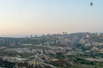 Hot air ballooning is a popular attraction in Cappadocia, Turkiye.
