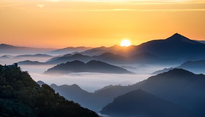 Fog rolling over a valley at dawn