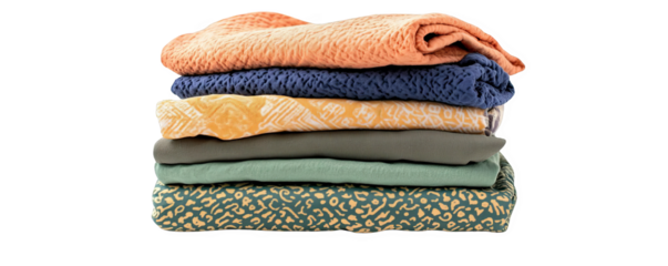Stack of colorful folded clothes in various fabrics and patterns, perfect for laundry, fashion, or textile themes. Multicolor garment pile.