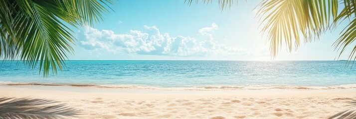 A serene beach scene with golden sand and clear blue sea under a sunny sky, featuring a palm leaf in the foreground and a tranquil ocean in the background
