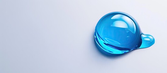 Blue serum toner drop with a glycerin gel texture on a white background with copy space image