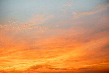 Beautiful , luxury soft gradient orange gold clouds and sunlight on the blue sky perfect for the background, take in everning,Twilight, Large size, high definition landscape photo