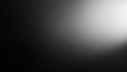 Naklejka premium Soft Spotlight on Textured Black Surface. Gradual Transition from Dark to Light Gentle Illumination Effect with Fine, Subtle Grainy Details. Minimalist Aesthetic