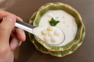 Bua Loy is a traditional Thai dessert made of glutinous rice flour balls in coconut milk. The soft,...