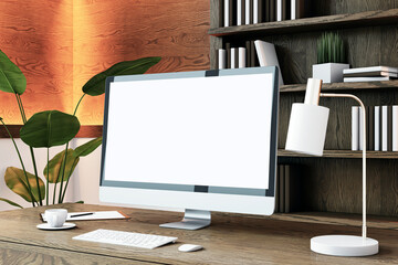 Modern desktop computer mockup on a wooden desk in a cozy home office. 3D Rendering