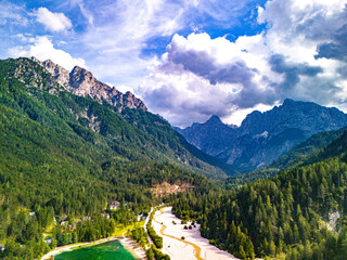 Aerial view of the beautiful Julian Alps and Lake Jasna in Kranjska Gora, Slovenia shot with a drone