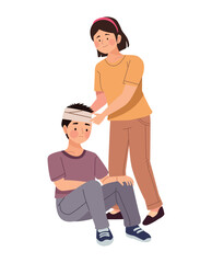 woman doing first aid to boy