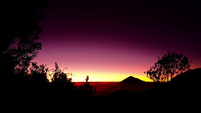 timelapse view of Mount Cikuray and clear sky. sea ​​of ​​clouds on a mountain