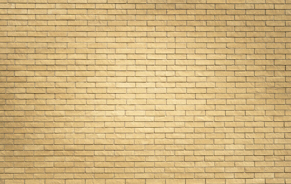 Fototapeta Yellow brick wall background, warm beige brick wall backdrop
