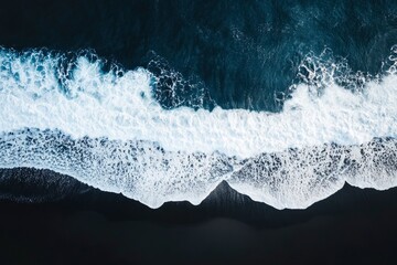 Obraz premium aerial top down view of beautiful white blue water waves splashing over dark beach, ai