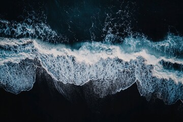 aerial top down view of beautiful white blue water waves splashing over dark beach , ai