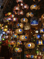 Colorful handmade turkish lamps hanging in shop at grand bazaar,