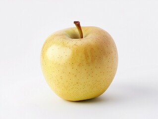 Close-up of a yellow apple on a white background.