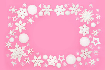 Christmas white snowflake star sphere decorative background border on pink. Abstract fantasy design for the festive holiday season, greeting card, gift tag, label. 