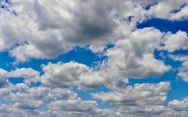 The white cloudscape in the blue sky.