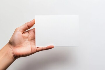 Blank brochure holding hand isolated on white background