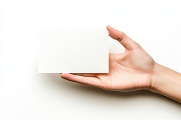 Obraz premium Blank invitation holding hand isolated on white background