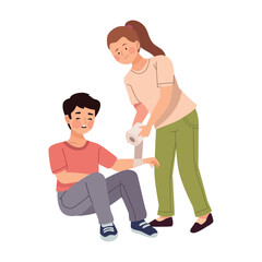Obraz premium woman giving first aid to a boy