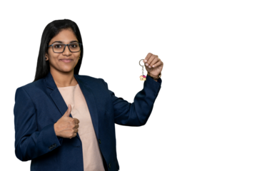 Indian Woman Realtor with Thumbs up and Holding Home Key Signifying Home Ownership and Financial Success