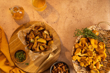 Chanterelle mushrooms fried in cast iron frying pan, herbs for roasted chanterelles thyme, oil and...
