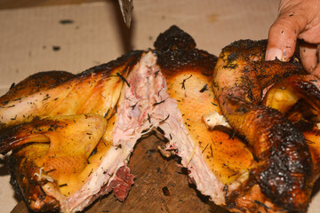 Typical Indonesian grilled chicken grilled using charcoal. Grilled chicken with Indonesian herbs and spices, Indonesian concept food