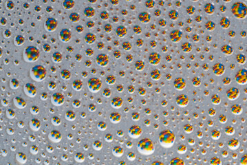 Colorful artistic background. White surface with water bubbles. Coloured spheres and circles