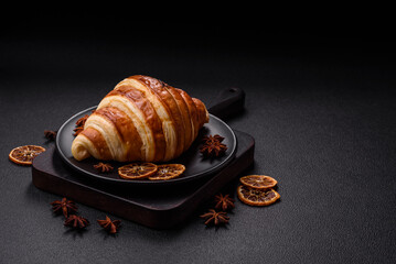 Delicious crispy sweet croissant cornet with chocolate