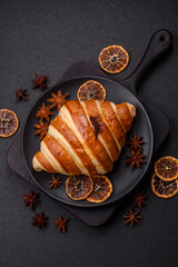 Delicious crispy sweet croissant cornet with chocolate