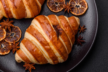 Delicious crispy sweet croissant cornet with chocolate