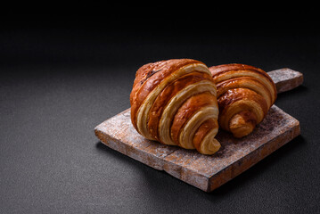 Delicious crispy sweet croissant cornet with chocolate