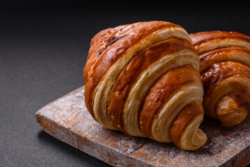 Delicious crispy sweet croissant cornet with chocolate