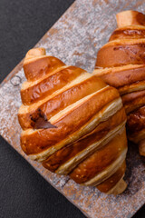 Delicious crispy sweet croissant cornet with chocolate