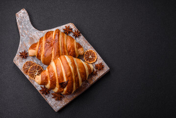 Delicious crispy sweet croissant cornet with chocolate
