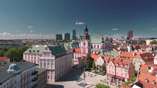 Summer skyline cityscape of Poznan (Poznań), Poland. Wide panoramic view of Plac Kolegiacki square and Basilica of Our Lady of Perpetual Help in Poznań Fara (Fara Poznańska)