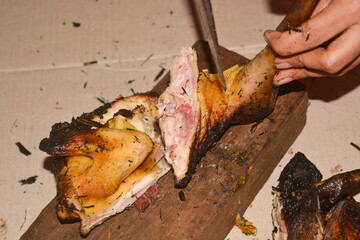 Typical Indonesian grilled chicken grilled using charcoal. Grilled chicken with Indonesian herbs and spices, Indonesian concept food