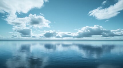 Obraz premium Calm Sea With White Clouds Reflected on Water