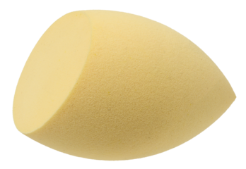 Yellow egg shaped makeup sponge on isolated background