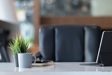 Inside the office there is a desk that is prepared for businessmen to start working every morning. A comfortable and ready-to-work desk idea to start your work every morning with joy.