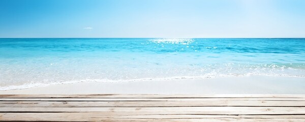 Tranquil beachfront view with gentle waves lapping against the shoreline at sunrise