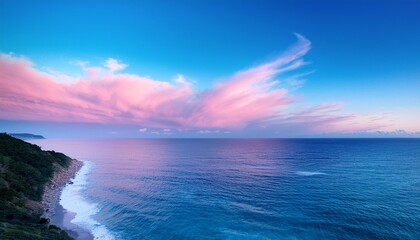Fototapeta premium A pink and blue sky over the ocean
