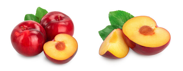 fresh red plum and half with leaves isolated on white background