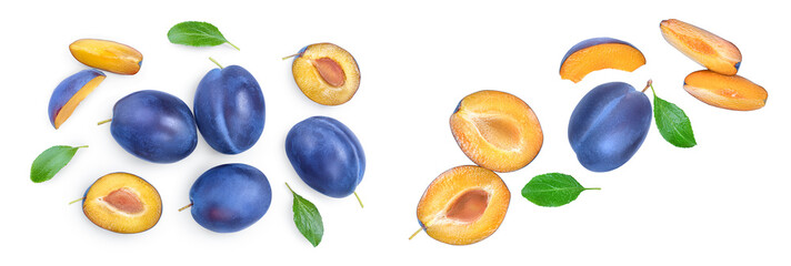 fresh plum and half with leaves isolated on white background. Top view. Flat lay