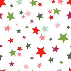 All over seamless vector repeat pattern with hand drawn stars in Christmas red and green colors tossed on white.