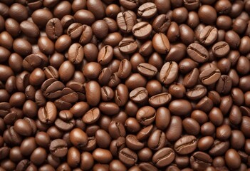 Fototapeta premium Close-up of roasted coffee beans, with their rich brown color and textured surfaces filling the frame
