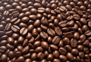 Fototapeta premium Close-up of roasted coffee beans, with their rich brown color and textured surfaces filling the frame