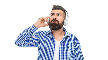 Generation z lifestyle. Man listening audio in music headphones. Bearded man on white. Guy listen audio. Millennial hipster man listen to music in headphones. Music concept. Inspirational music