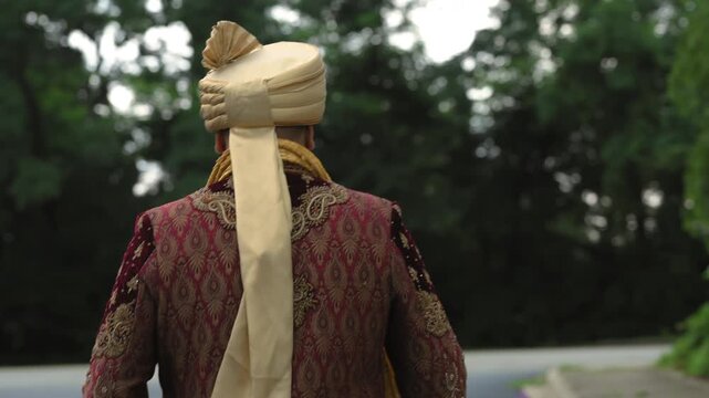 Groom Dressed in traditional Indian clothes, Elements of hindi wedding. Close up view footage