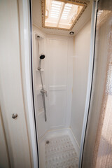 Cozy Caravan Interior with Fully Equipped bathroom. Ideal for Glamping, Camping, and Mobile Living