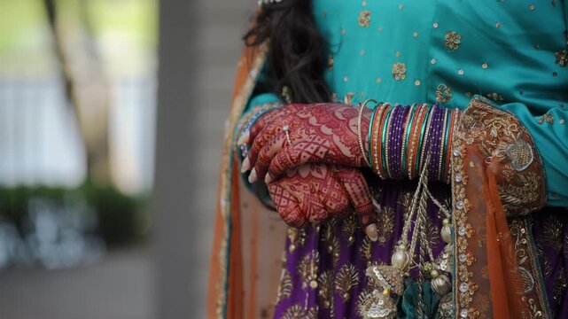 Woman Dressed in traditional Indian clothes, Elements of hindi wedding event. Close up shot