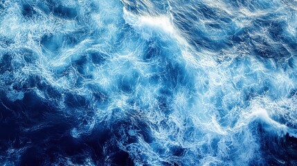 Obraz premium High-definition top-down image of the Pacific Ocean, featuring a tumultuous display of waves and their swirling, frothy patterns